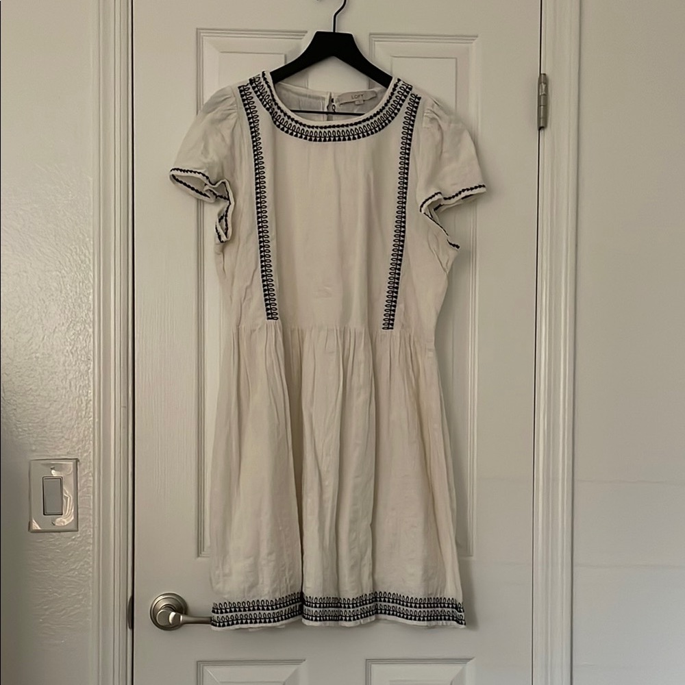 Elegant White Dress with Black Trim